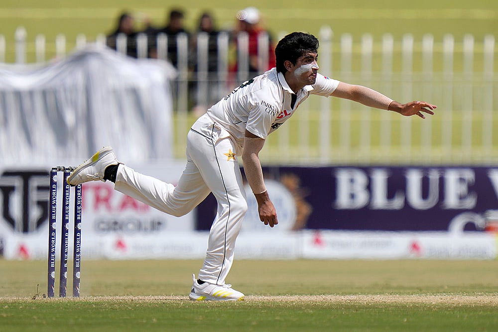 | Photo: AP/Anjum Naveed : Pakistan vs Bangladesh 1st Test, 3rd Day: Pakistan's Naseem Shah bowls against Bangladesh